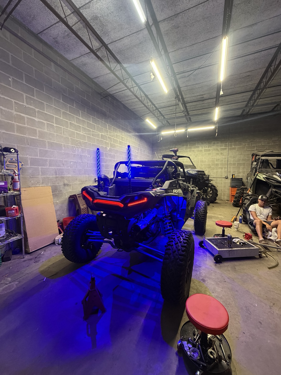 Custom RZR lighting inside the shop